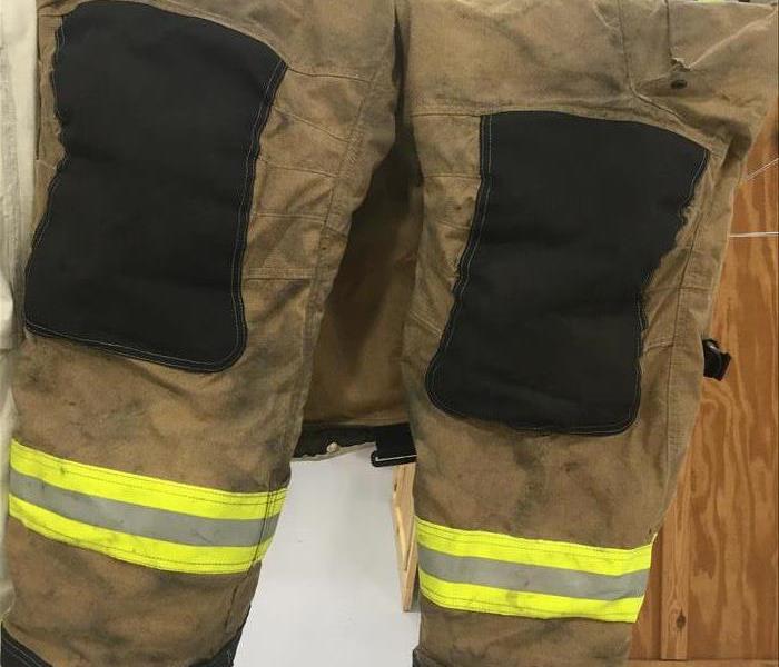 image of dirty looking worn out firefighter pants