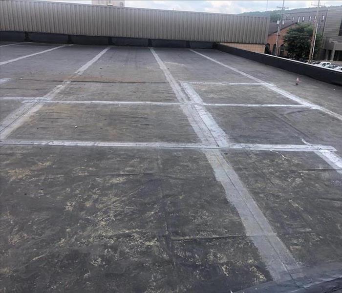 image of same commercial roof after it has been fully repaired 